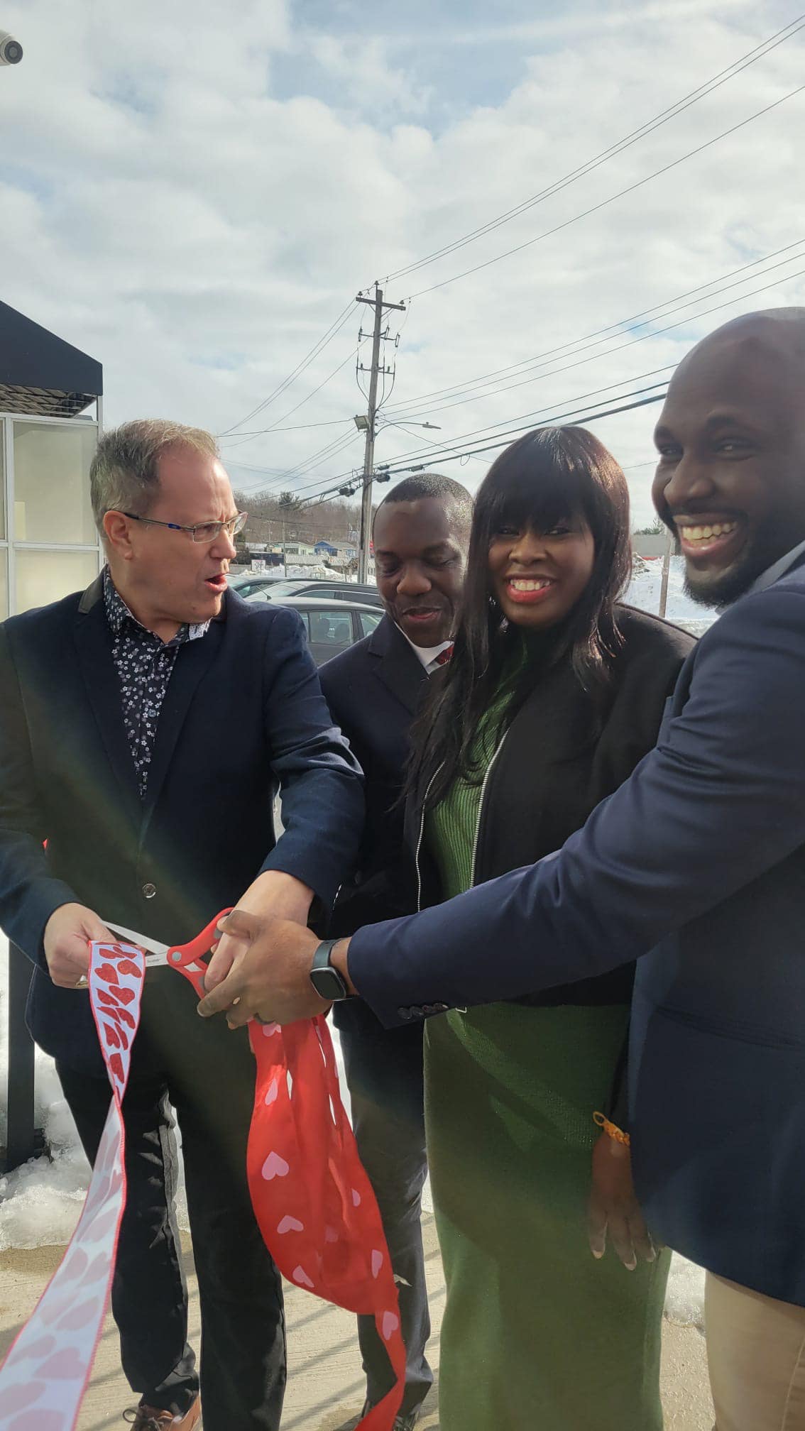 RBC Business Account Manager Liston Bailey (far right), with Motunrayo Ige (second from right), cutting the ribbon at opening day for Iyalode Africa Wholesale Market